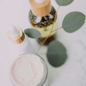 White and Brown Bottle on White Table